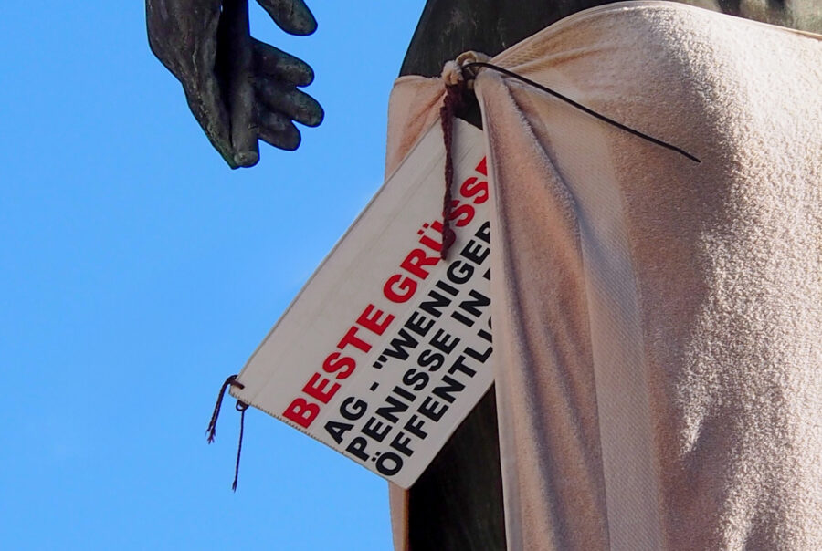 Beste Grüsse – AG – "Weniger Penisse in der Öffentlichkeit" an Statue bei der HfG in Offenbach