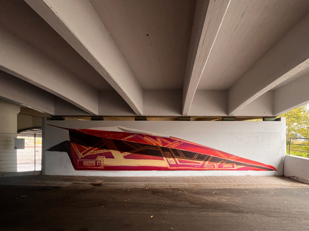 Case Ma’Claim – Papierflieger-Wandbild in Bad Vilbel