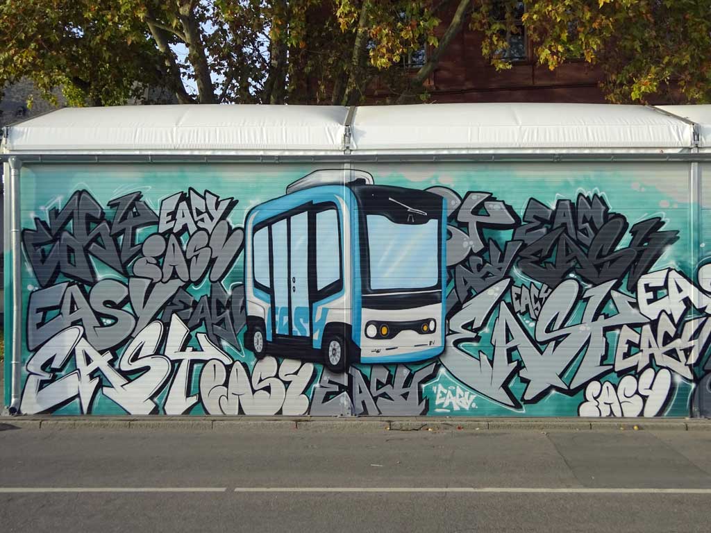 Graffiti am Container-Depot für die autonom fahrenden Minibusse in Frankfurt am Main