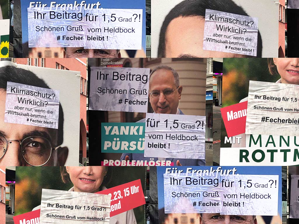 Mit „Fecher bleibt"-Zettel überklebte Frankfurter OB-Wahlplakate