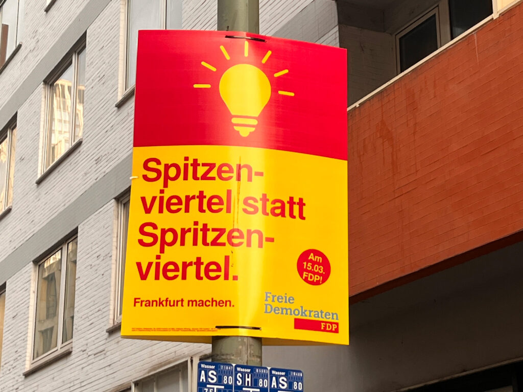 Spitzenviertel statt Spritzenviertel – Plakate zu den Kommunalwahlen 2026 in Frankfurt am Main