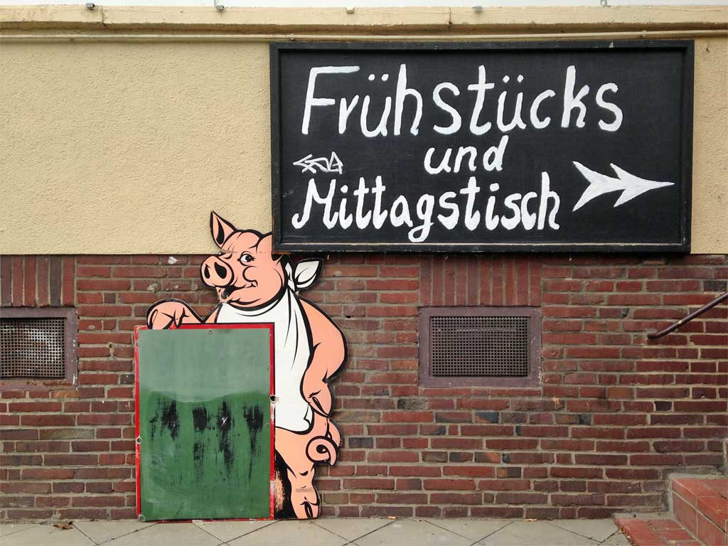 Schwein mit Tafel