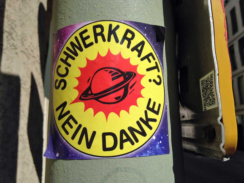 „Schwerkraft? Nein-Danke“-Aufkleber im Stile von „Atomkraft? Nein Danke“